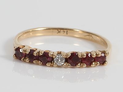 14K PINK SAPPHIRE & DIAMOND RING. 14K yellow gold band, central .025 carat round diamond 