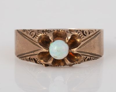 VICTORIAN GOLD and OPAL BAND. Yellow gold, marked on inside: K {star} marking; central opal 