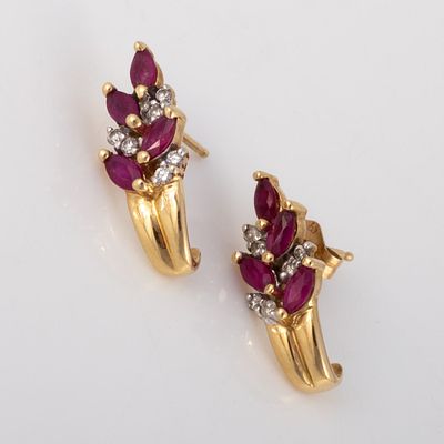 PAIR 14K YELLOW GOLD, RUBY & DIAMOND EARRINGS. 14K yellow gold earrings, set with (4) .05 carat 