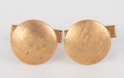 PAIR 14K YELLOW GOLD CUFFLINKS. Round textured surface; marked 14K, Dia.-3/8", [3.47 dwt total], VG