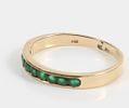 GOLD & STONE BAND. 14K yellow gold band with (9) round green stones; [1.55 dwt total]; size 8 3/4, VGImage - 2