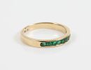 GOLD & STONE BAND. 14K yellow gold band with (9) round green stones; [1.55 dwt total]; size 8 3/4, VGImage - 4