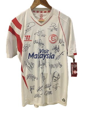 Warrior - Signed Sevilla FC shirt from the 2014/2015 season with tag. Signed Sevilla FC home shirt 
