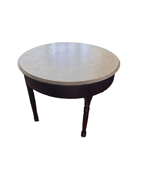 Round table with a cream and gray veined marble top. The marble top is framed by a dark wood 