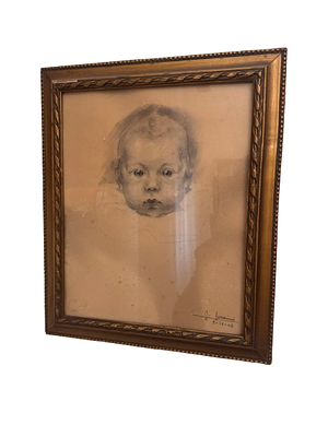 baby portrait. A delicate drawing depicting a baby's face, created with charcoal or pencil on 