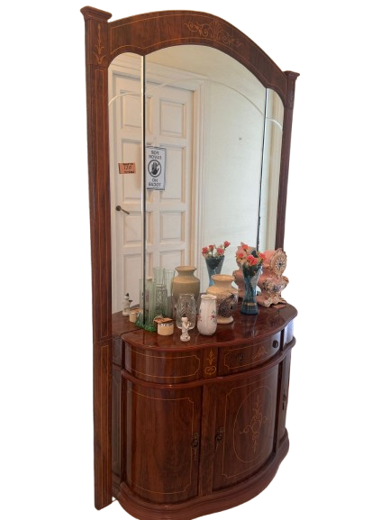 Classic wooden hall table with large mirror. A classic-style entryway console table with a 