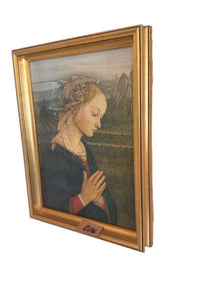 Virgin Mary print with gold frame. A decorative painting with a classic and religious aesthetic 
