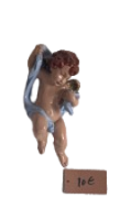 Miniature decorative figurine of a little angel. Charming small decorative figurine in a classic 