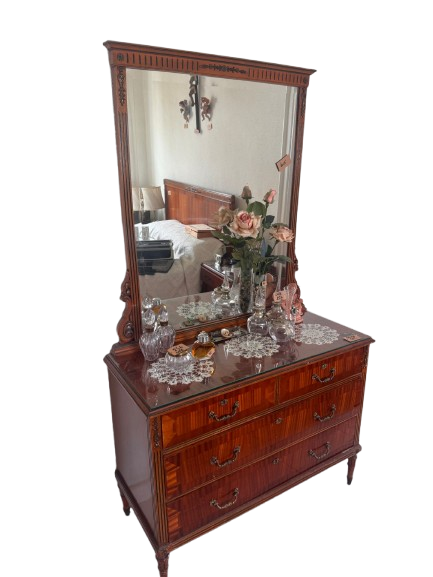 Classic bedroom dresser with mirror. Elegant bedroom furniture in a classic and stately style 
