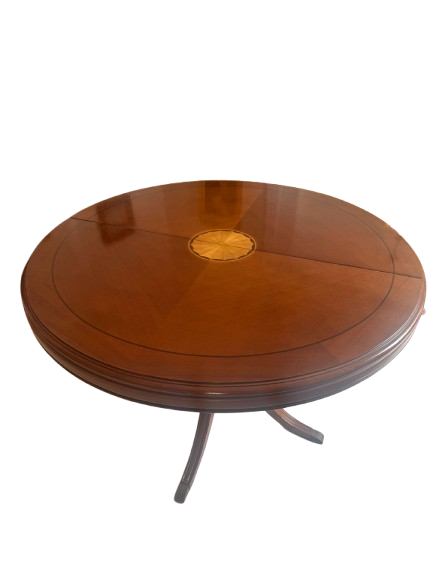round dining table. Elegant round dining table in a classic style, ideal for adding distinction 
