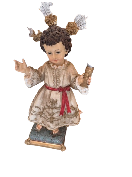 Ancient religious figure of the Child Jesus. A beautiful and delicate religious art figure 