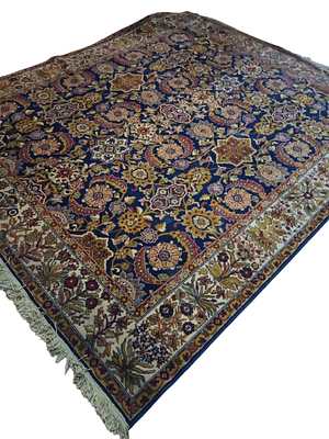 Classic oriental design rug with floral motifs and border. A beautiful rug in a classic style 