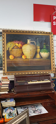 Classic painting with still life of fruit and vases. Oil painting on canvas in a classical style 