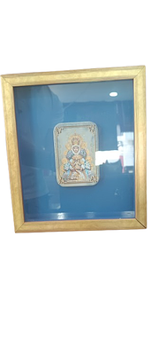 Decorative picture with framed religious print of the Virgin of the Head. A rectangular 