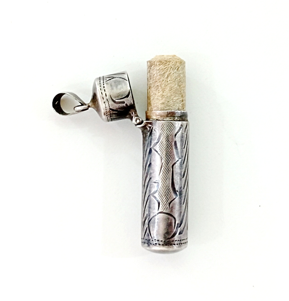 Amulet on Parchment for Protection in a Silver Case. תליון נרתיק עשוי כסף (חתום 925) בתוכו קמיע 