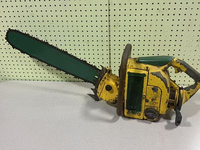 CMC Chainsaw with 24" Bar — pulls hard, working condition unknown