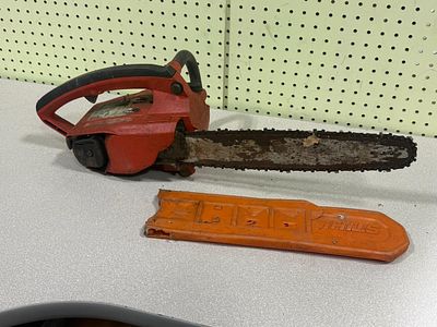 Homelite Super 2 Chainsaw with 14" Bar — has compression, working condition unknown
