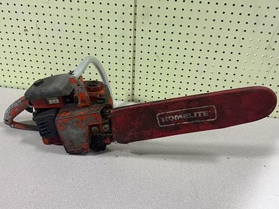 Homelite Super XL Automatic Chainsaw with 16" Bar — has compression, working condition unknown