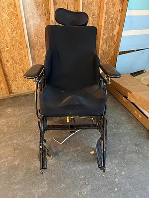 Invacare Solara Manual Tilt-In-Space Wheelchair. An Invacare Solara manual wheelchair featuring 