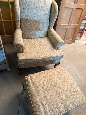 A Pair of Queen Anne Style Furniture Pieces Including a Wingback Chair and Ottoman. This 