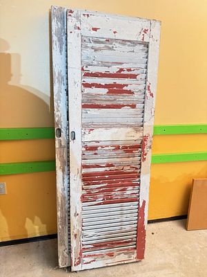 4- Vintage Two Panel Louvered Wood Doors with Distressed Paint Finish. This lot features a 