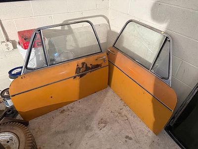 A Pair of Front Doors for an Austin America, based on color, likely from a 71