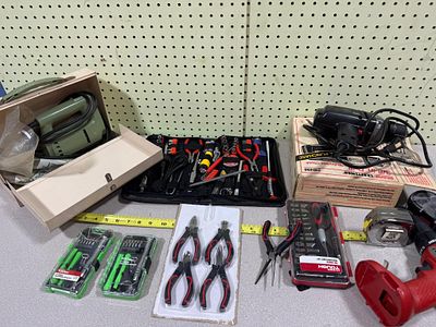 An Assortment of Vintage and Modern Power and Hand Tools including Craftsman, Skil, and Rockwell. 