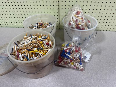 HUNDREDS of Assorted Wood and Plastic Golf Tees and Ball Markers in Three Buckets and Three Bags