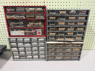 A Group of Four Vintage Multi-Drawer Hardware Cabinets with Fasteners. This collection consists 
