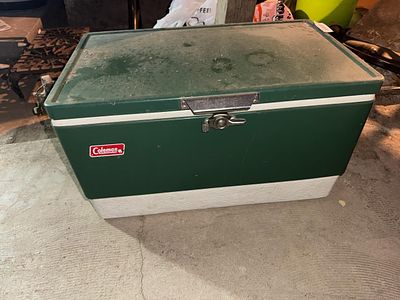 Vintage Coleman Green Metal Ice Chest Cooler. Auction pickup for this auction is Saturday June 