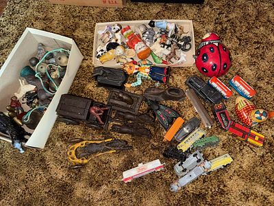 An Assortment of Vintage and Antique Toys Including Kuramochi Tin Lithograph and Cast Iron Pieces. 
