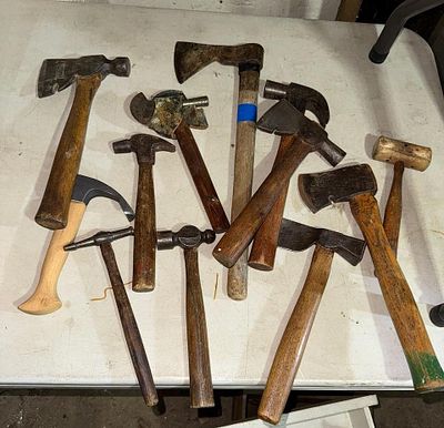 An Assortment of Vintage Steel and Wood Hand Tools Including Stanley and Champion Hatchets. This 