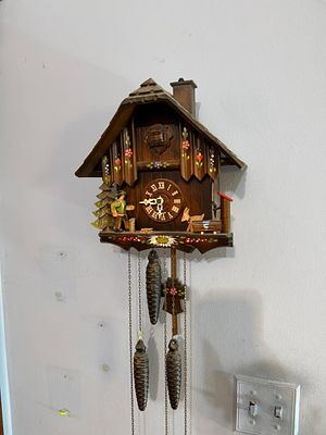 Scharz-Wade Black Forest Musical Chalet Cuckoo Clock with Woodchopper and Deer. A traditional 