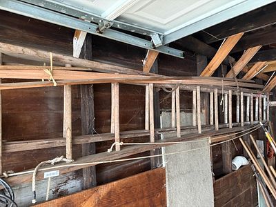 Vintage Two-Section Wooden Extension Ladder with Rope and Pulley System, approx 20'. This 