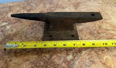 Vintage Small Cast Metal Bench Anvil with Hardy Hole. Overall length: Approximately 8.75 