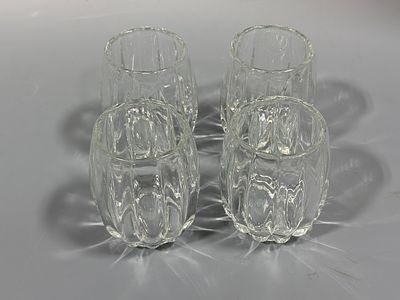 A Set of Four Heisey Glass Company Pressed Glass Fluted Juice Glasses