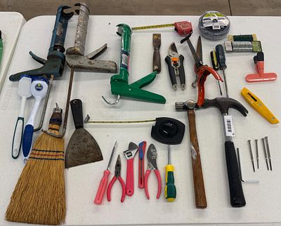 Assortment of Hand Tools and Home Maintenance Supplies including Caulking Guns, Hammers, and Pliers