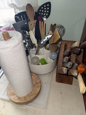 An Assortment of Kitchen Utensils, Cookware, and Tabletop Accessories