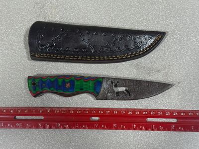 Fixed Blade Hunting Knife with Decorative Deer Cutout and Laminated Wood Handle. This knife is 