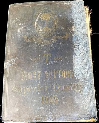 A 1902 Austrian 'Tree Make' Ivory Buttons Sample Book. An early 20th-century cloth-bound sample 