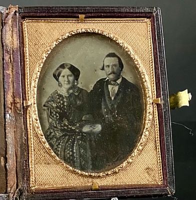 Mid-19th Century Leather-Cased Ambrotype of a Couple. A mid-19th century cased ambrotype 