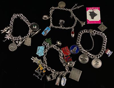 Five Vintage Sterling Silver Charm Bracelets and a Group of Loose Charms. This lot comprises 