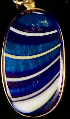 A Carder Steuben Pendant Necklace with Aurene Pulled Feather Design. Made by Tom Dimitroff from 