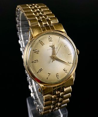 Vintage Wittnauer Men's 10K Gold Filled Bezel & Stainless Steel Back Wristwatch. A vintage 