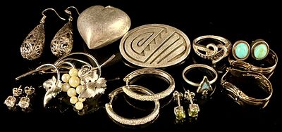 A Collection of 10 Sterling Silver and Silver-Toned Jewelry Items 2 ozt. A collection of 10 
