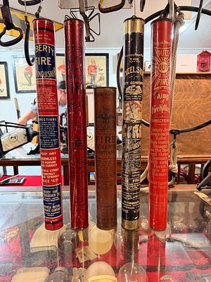 A Collection of Early 20th Century American and Canadian Tin Tubular Dry Powder Fire Extinguishers. 