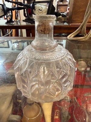 An Antique Hayward Hand Grenade Fire Extinguisher, No. 40. An antique clear molded glass fire 
