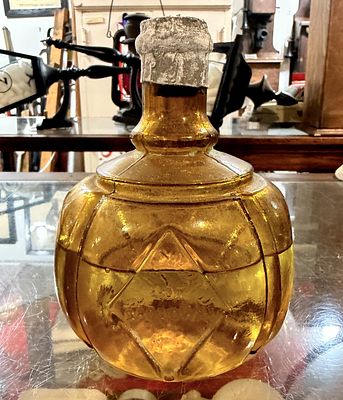 Hayward's Hand Fire Grenade Extinguisher, Amber Glass, Broadway 1897. No. 407, An amber-colored 