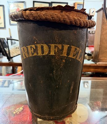 An Antique American Leather Fire Bucket, Inscribed 'H.J. REDFIELD'. An antique American leather 