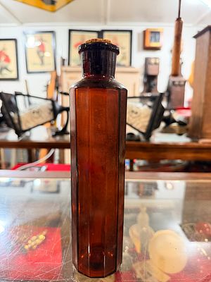 Antique Amber Octagonal Glass Carbona Fire Extinguisher Bottle. An antique or vintage amber 